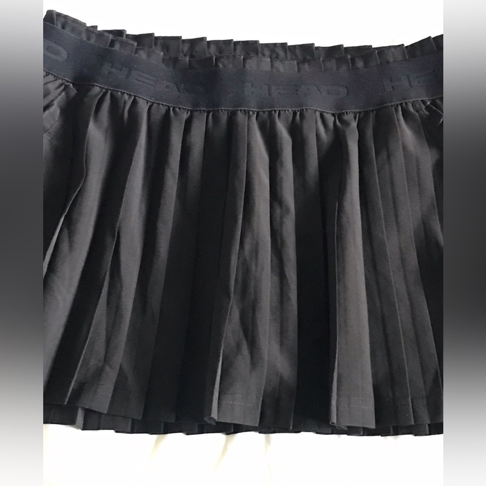 HEAD ,MEDIUM miniskirt , black color